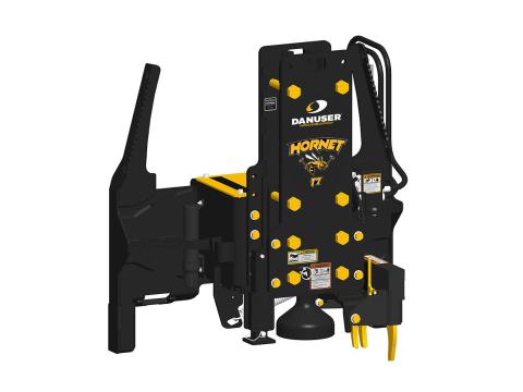 Image showing Danuser Hornet T7 post driver for skid steer, front-left view with yellow 'HORNET T7' text and grapple feature