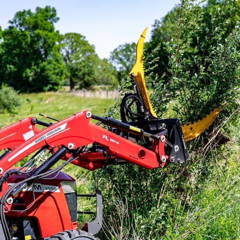 Intimidator CT mounted on tractor pulling a tree