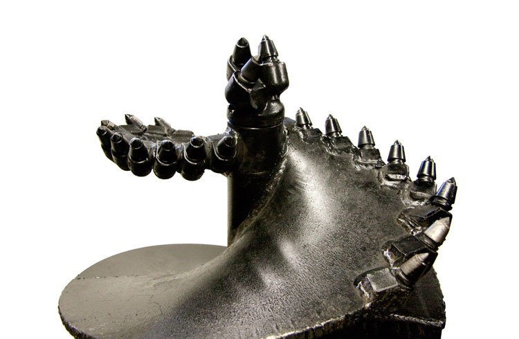Tip of rock auger showing bullet teeth