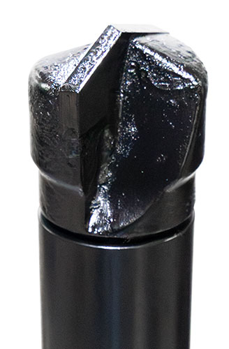close up of tip of 2 inch rock drill showing the carbide tip that cuts into rock