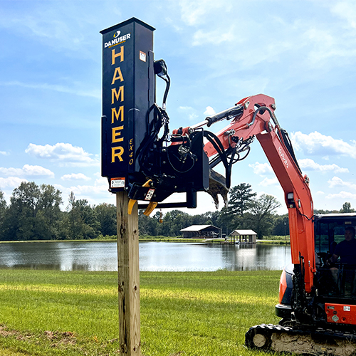 Hammer post driver on excavator
