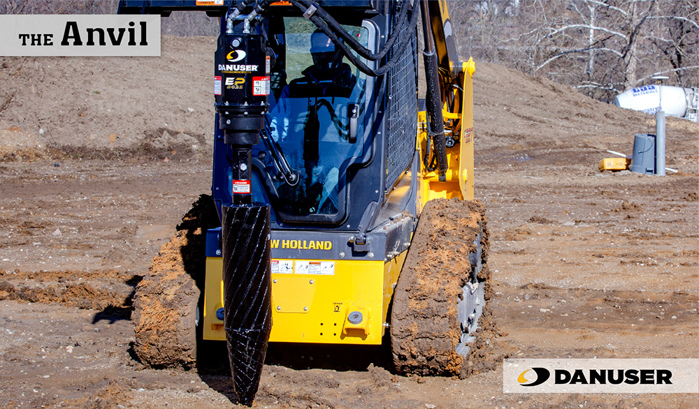 Danuser wobble auger attached to an EP Auger drive mounted on a New Holland Skid-steer